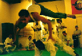 Photo of Marcio leapfrogging over a Mestre.